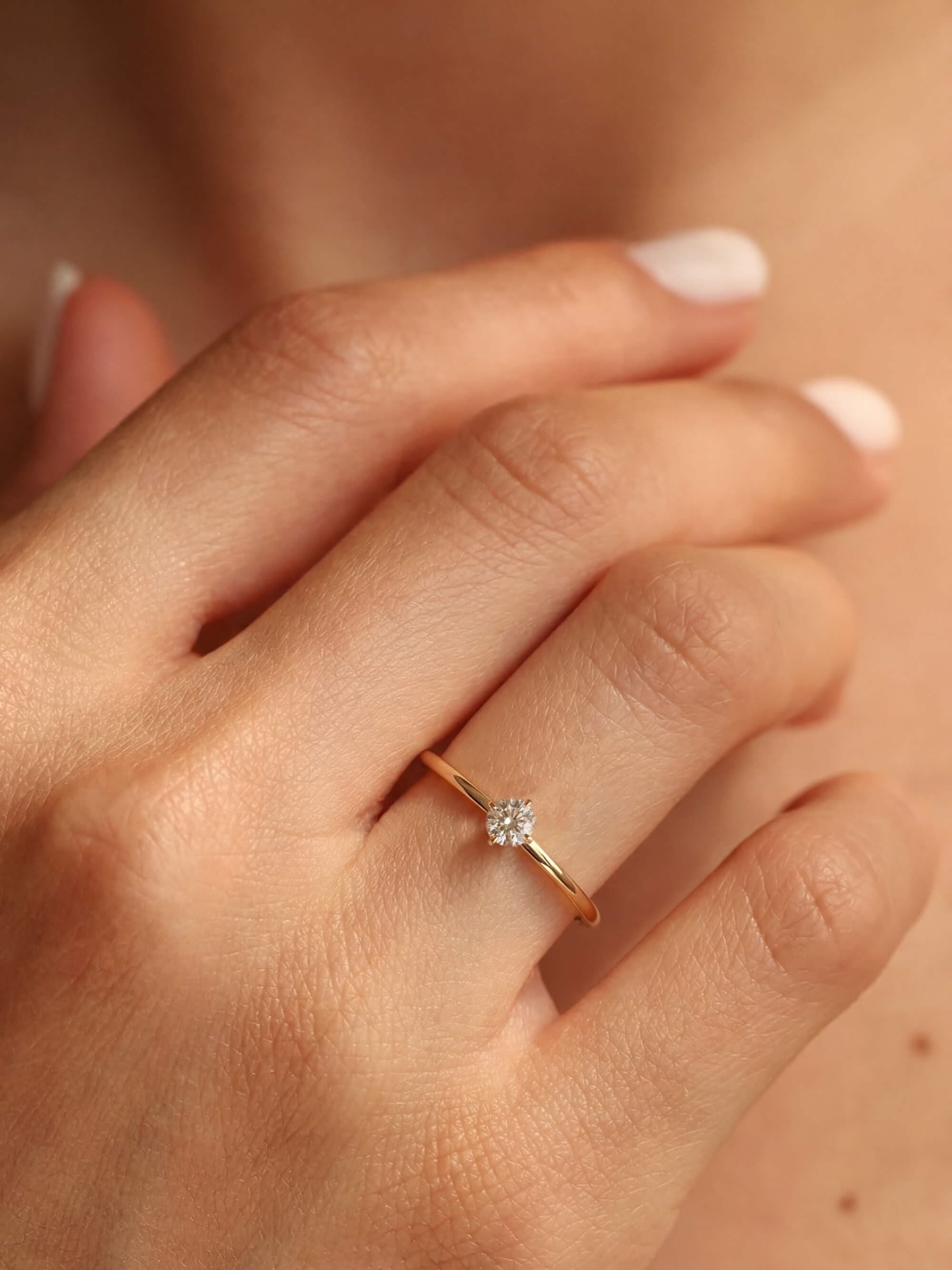 Cardinal Ring on hand rose gold