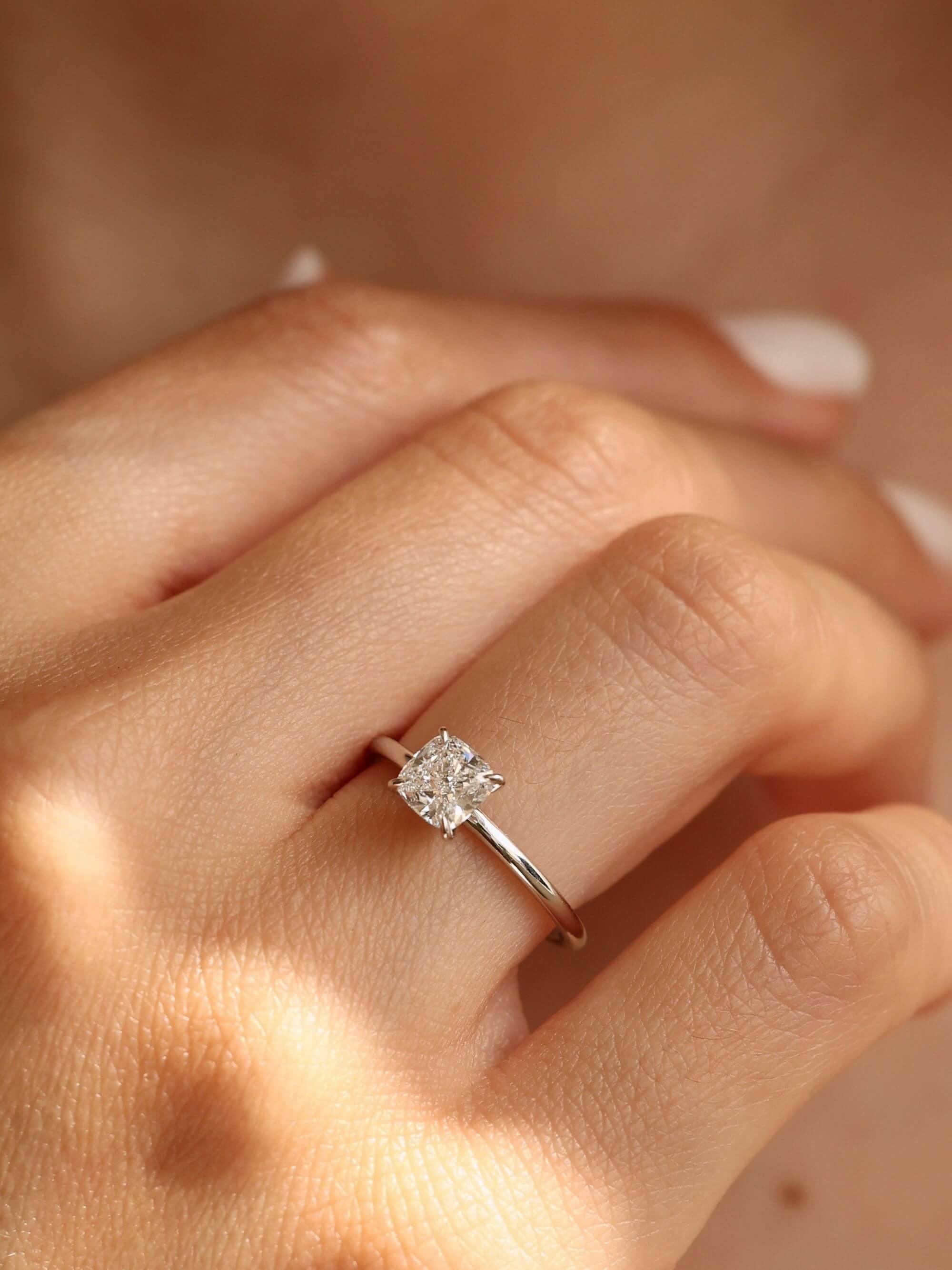 Classic Cushion Cut Ring on hand in white gold