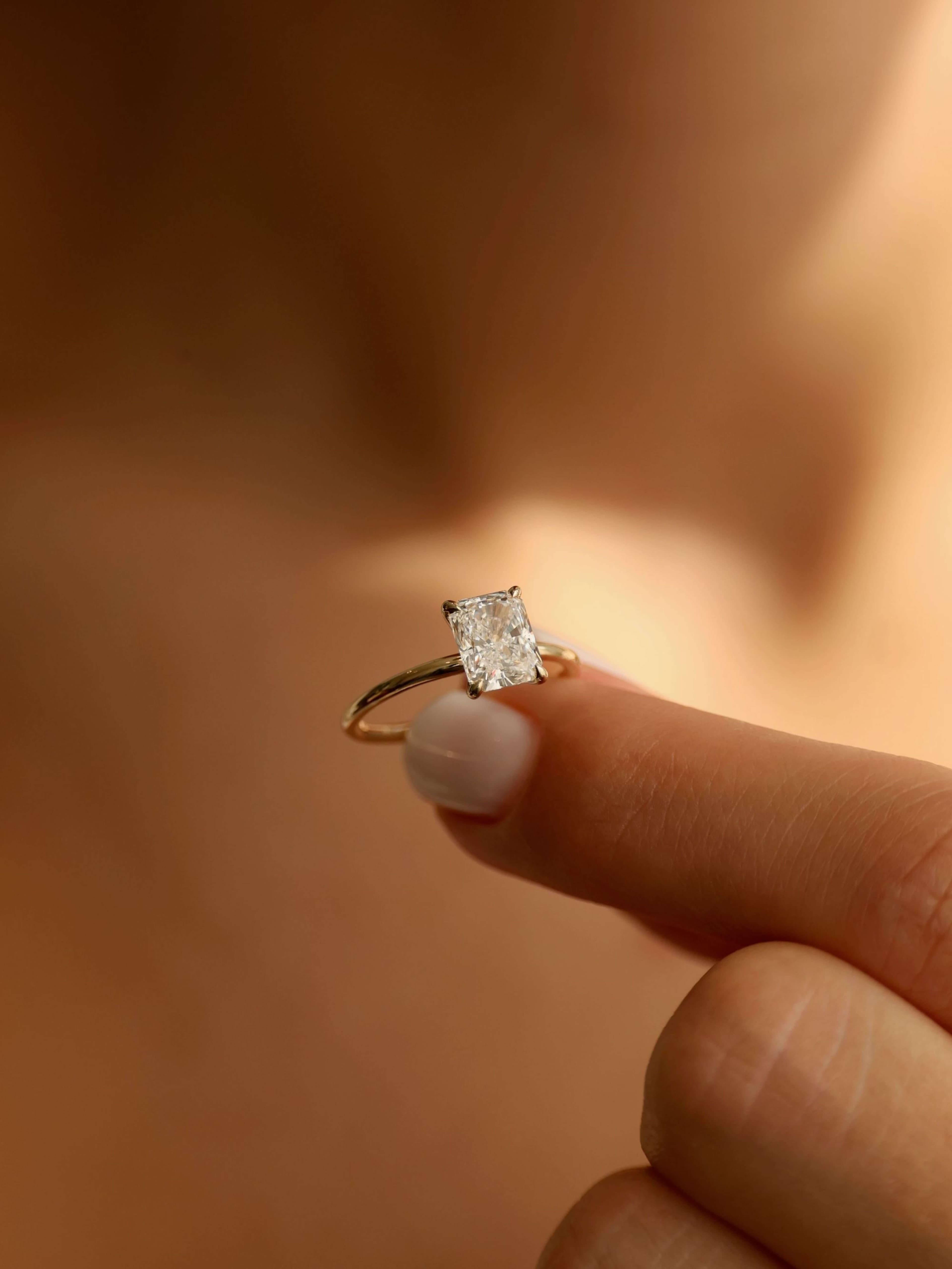 Classic Emerald Cut Ring M on finger