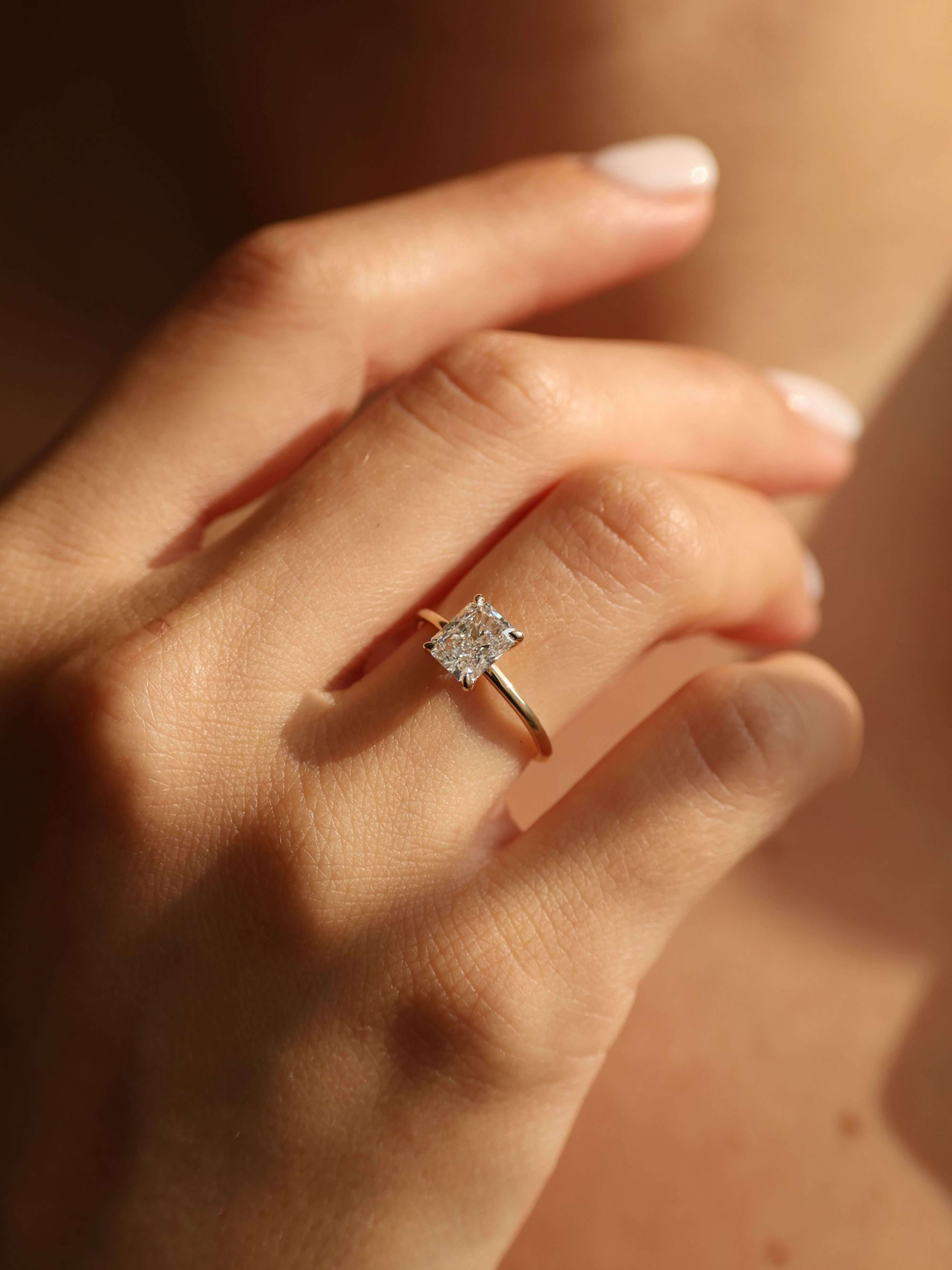 Classic Emerald Cut Ring M on hand