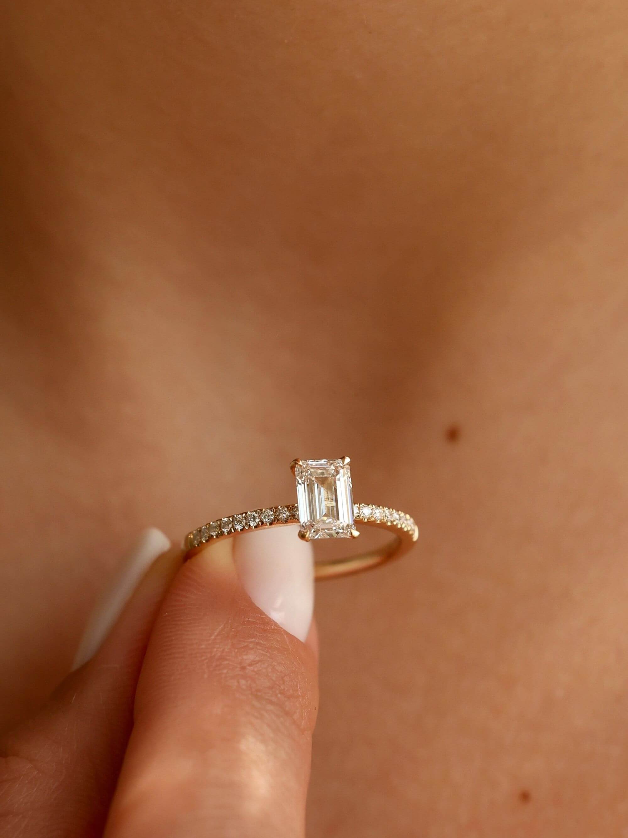 Pavé Emerald Cut Ring on finger