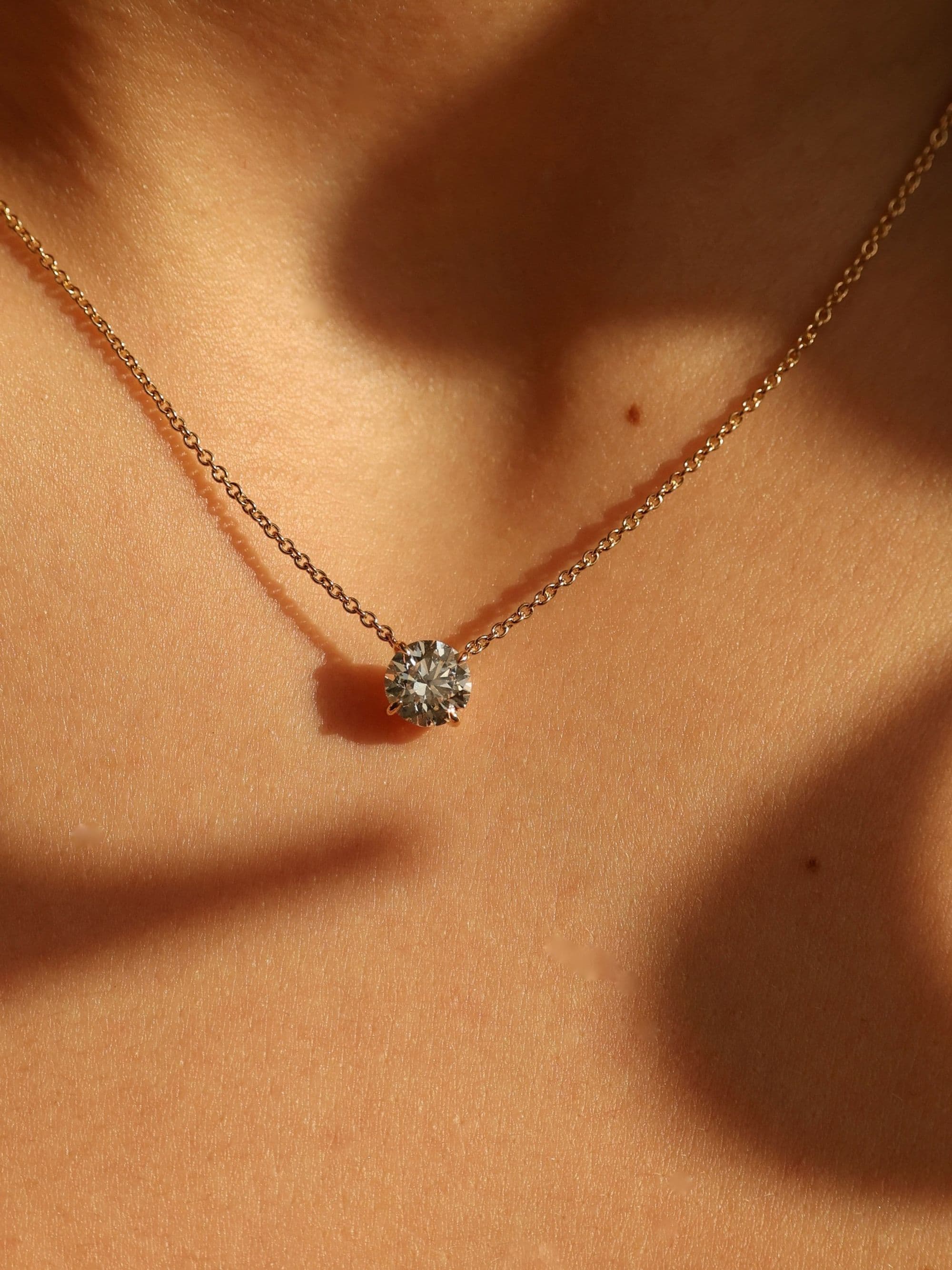 Round Brilliant Pendant worn on neck