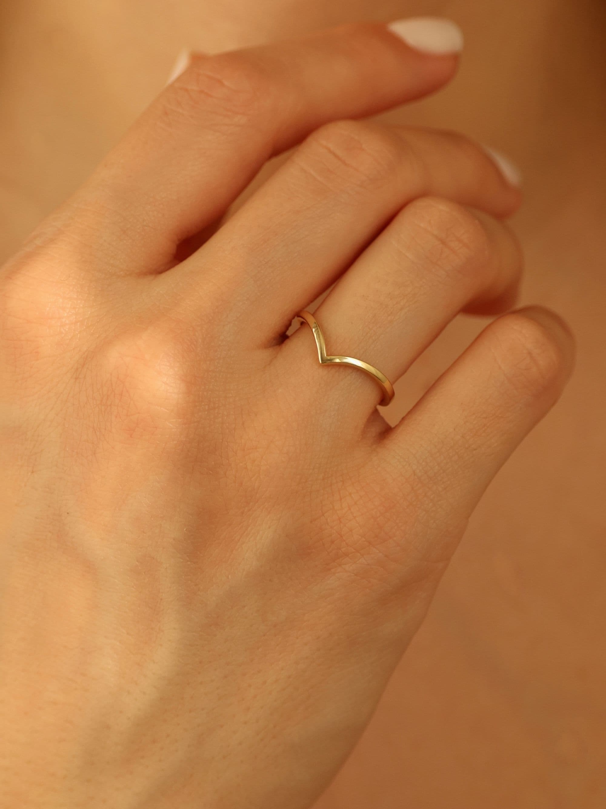 Women's Symbol Ring on hand
