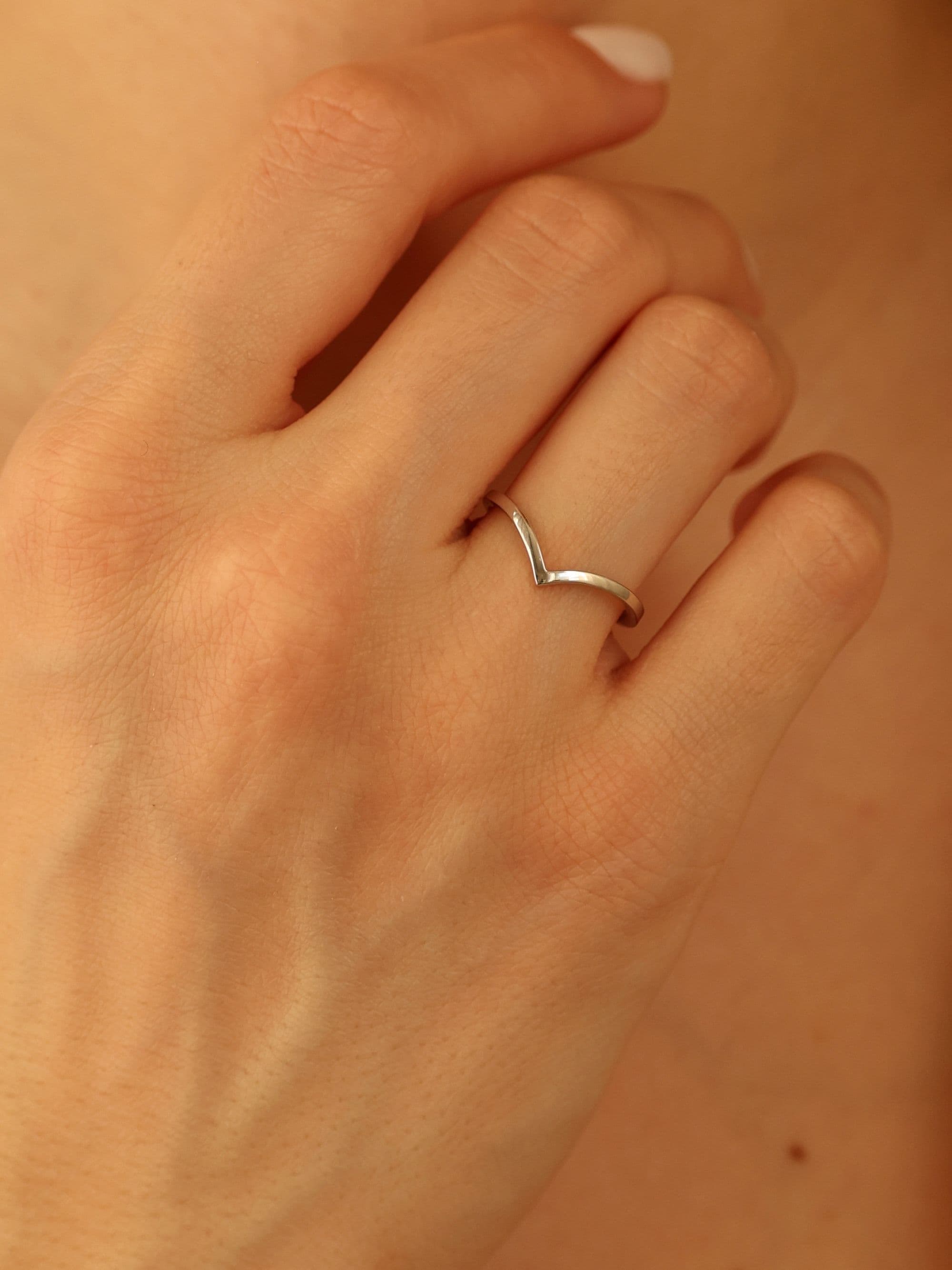 Women's Symbol Ring worn on hand