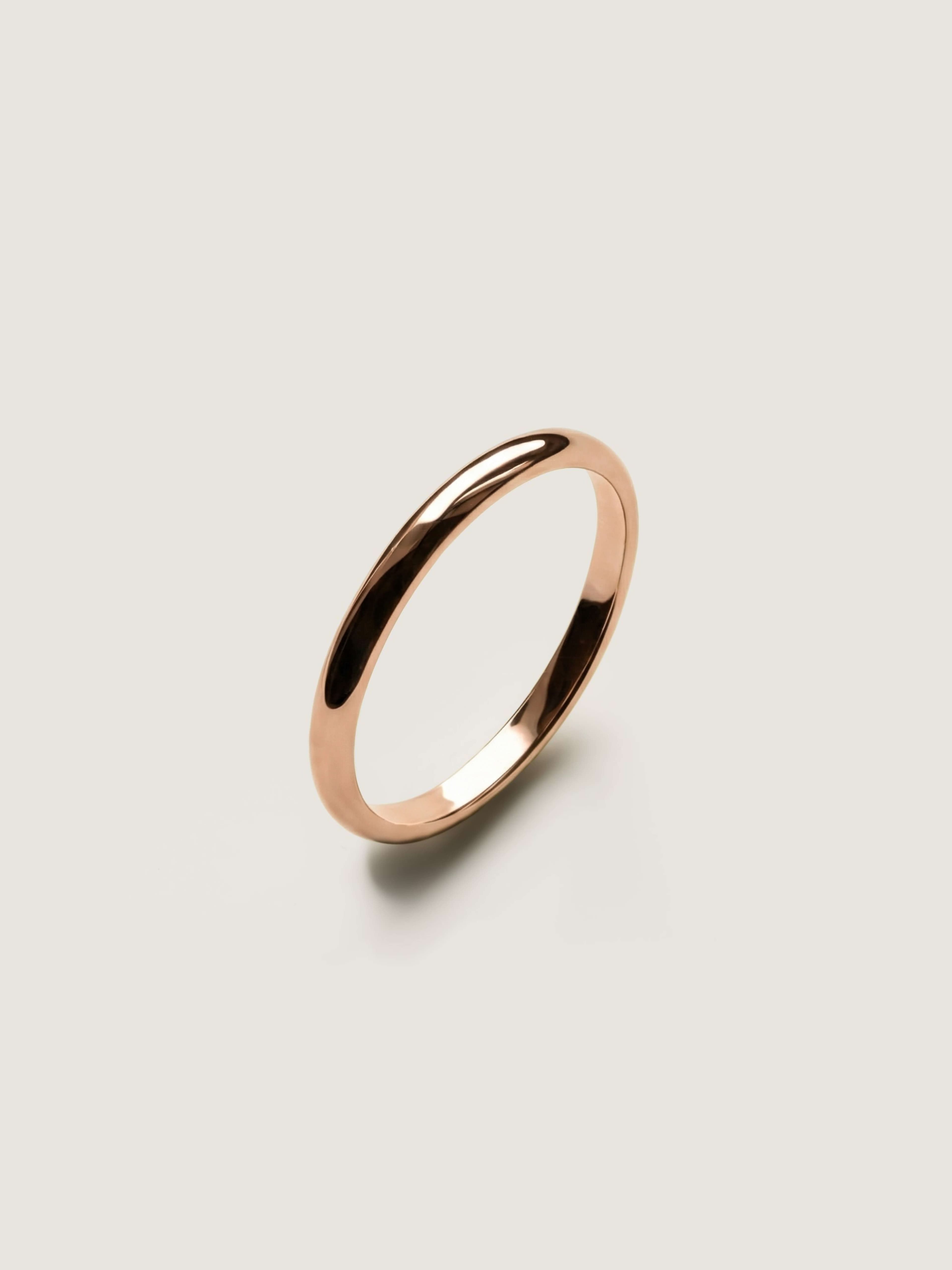 Classic 2 mm half-round wedding ring in rose gold