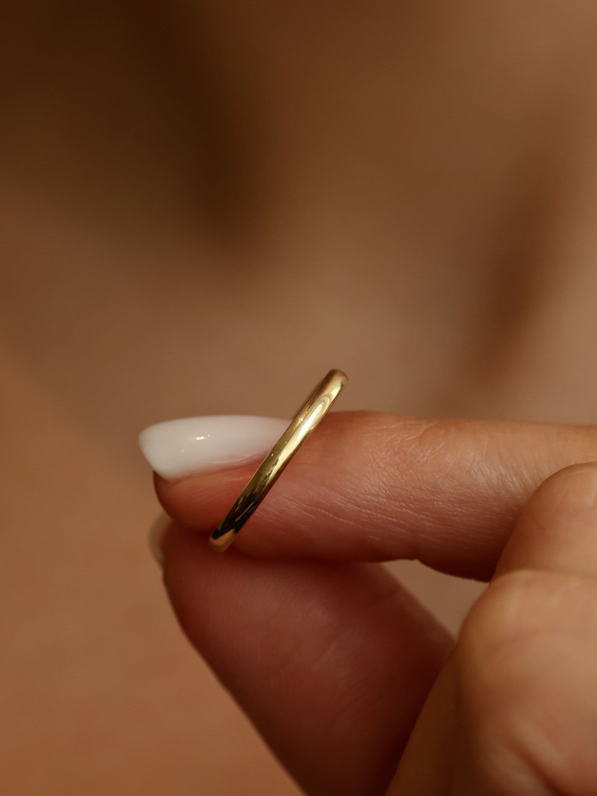 Classic 2 mm half-round wedding ring with subject